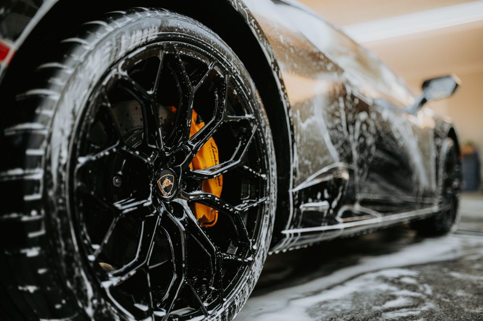 A shiny, clean luxury vehicle after a premium car wash